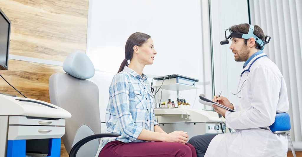 Woman getting eye exam