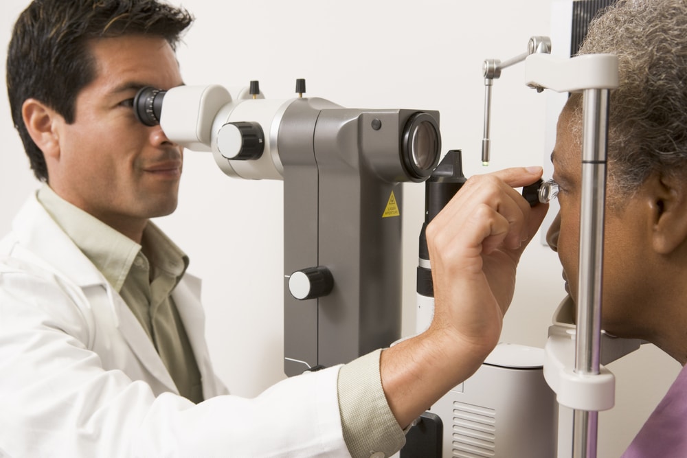 Doctor giving an eye exam