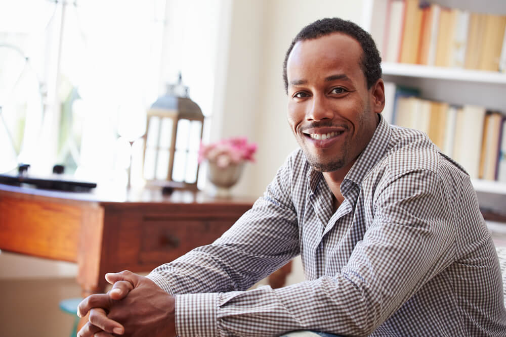 Smiling man in a home